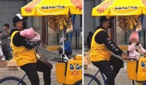 Vendedor de helados es captado vendiendo junto a su hijo recién nacido
